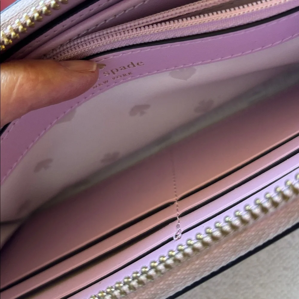 kate spade Leather Zip-Around Wallet in Mauve Pink with Gold Logo